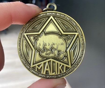 Porte-clé Médaille Maliki en métal